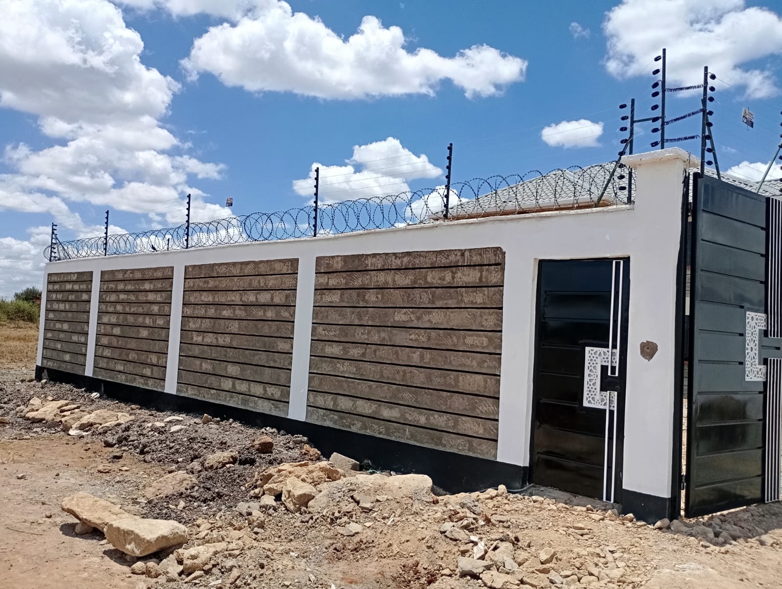 cost of fencing 50 by 100 plot in kenya